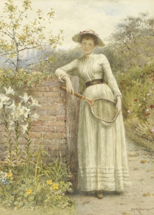 A young lady with a tennis rocket
